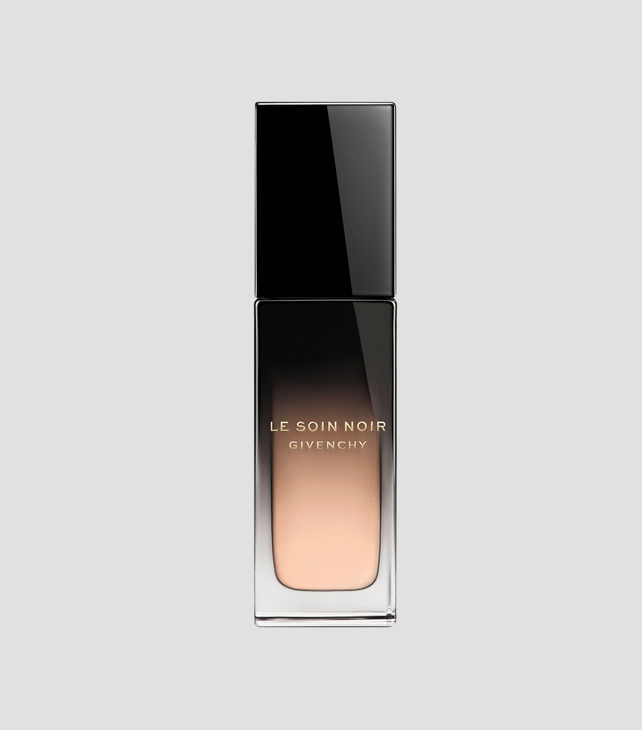 Base de maquillaje con suero Le Soin Noir Fond de Teint Sérum, 30 ml
